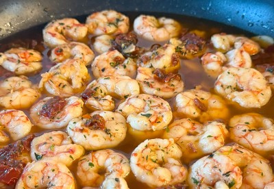 Argentinsk skalad rödräka med soltorkad tomat, piri piri & vitlök 
